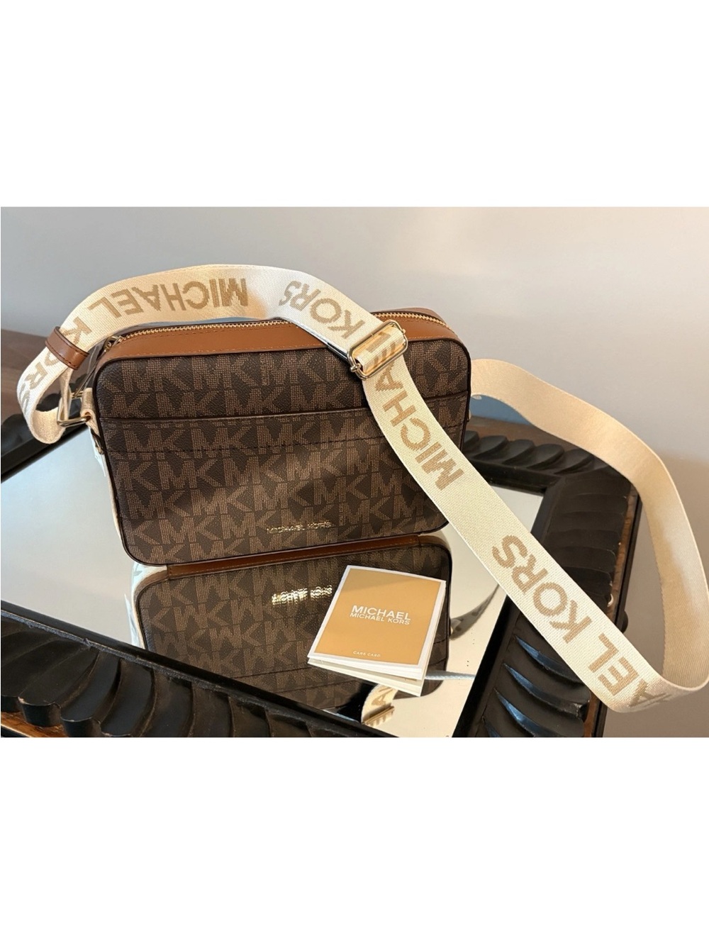 Michael Kors Brown Monogram Crossbody with Cream Logo Strap